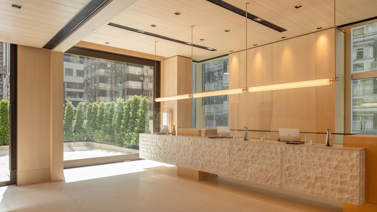 Project photograph of a coordinated hospitality arrival lobby.